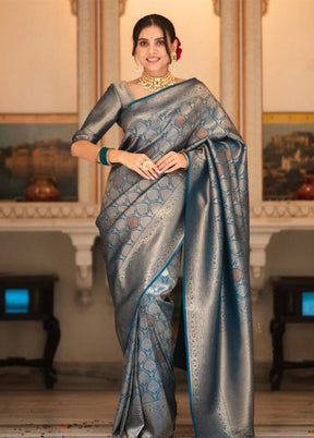 Teal Banarasi Silk Saree With Blouse Piece