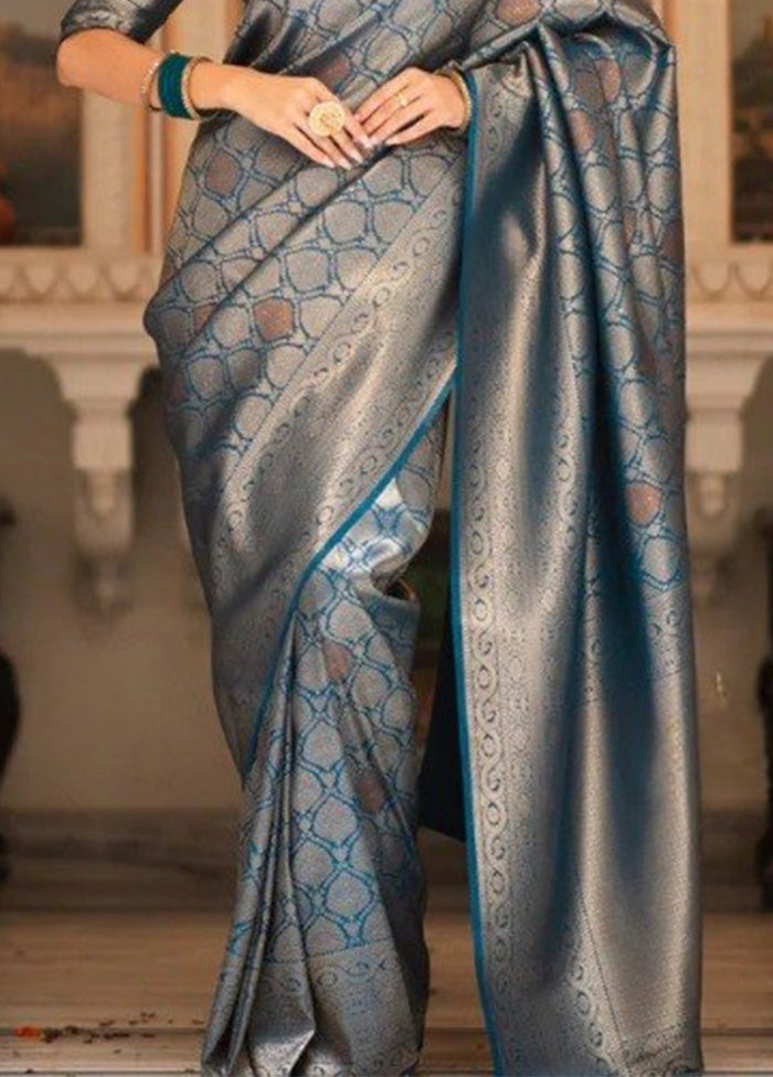 Teal Banarasi Silk Saree With Blouse Piece