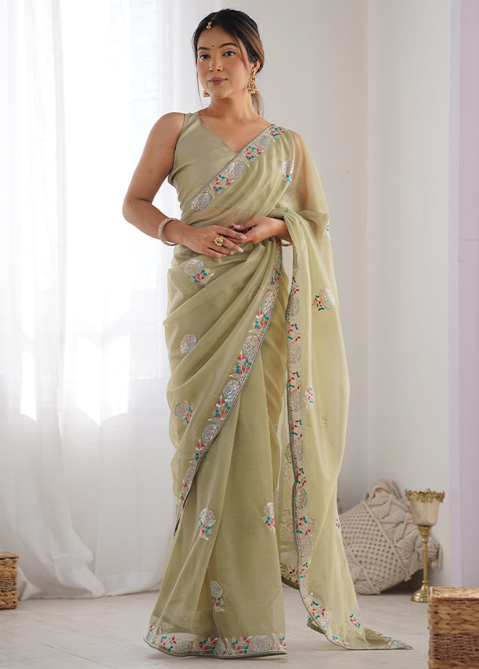 Pista Green Net Net Saree With Blouse Piece