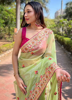 Green Net Net Saree With Blouse Piece