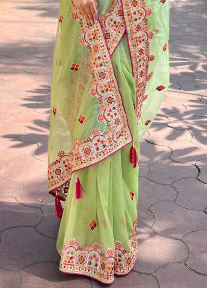 Green Net Net Saree With Blouse Piece