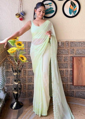 Pista Green Georgette Saree With Blouse Piece