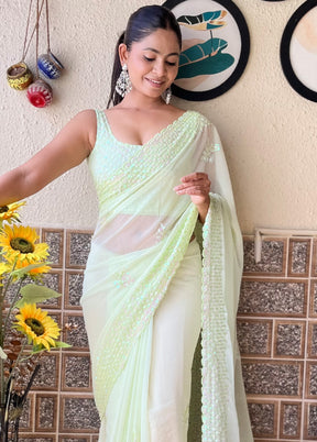 Pista Green Georgette Saree With Blouse Piece