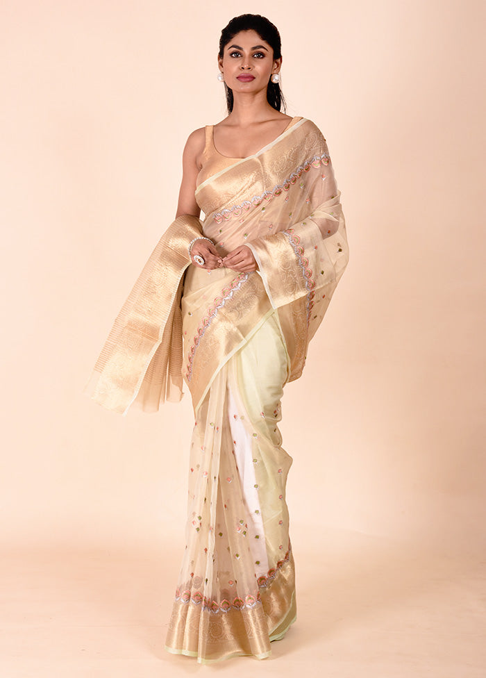 Green Tissue Silk Saree With Blouse Piece