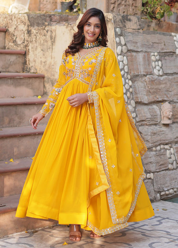 Golden Woven Work Silk Gown With Dupatta