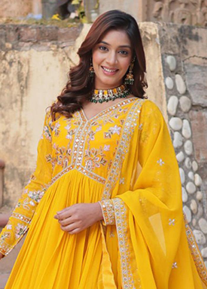 Golden Woven Work Silk Gown With Dupatta