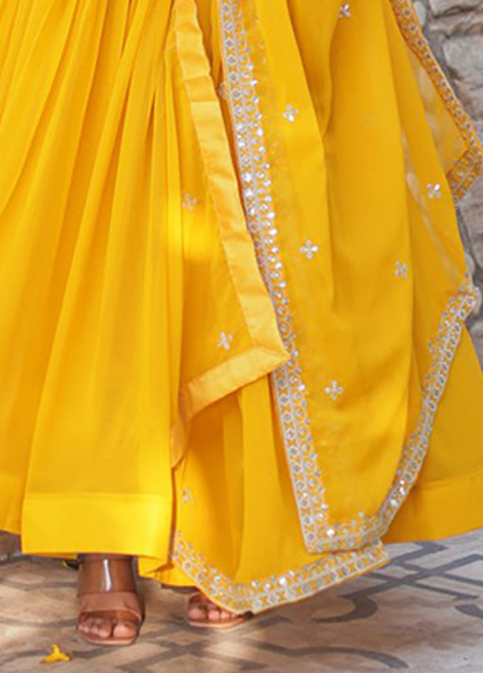 Golden Woven Work Silk Gown With Dupatta