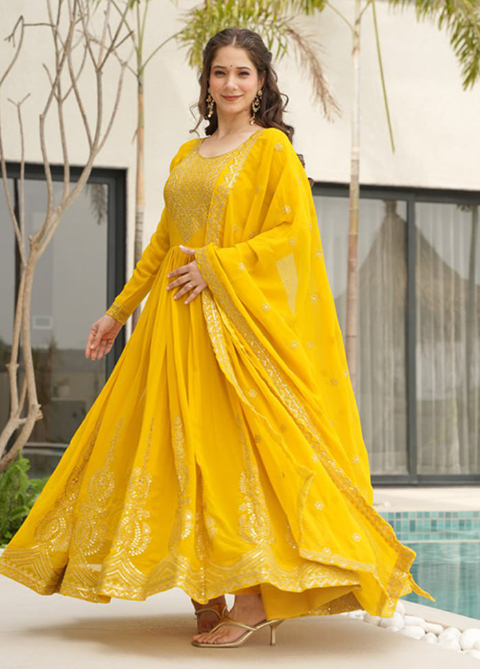 Golden Woven Work Silk Gown With Dupatta