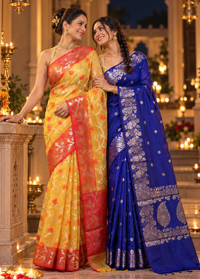 Sneh Bandhan Duo – Red Organza & Blue Cotton Sarees
