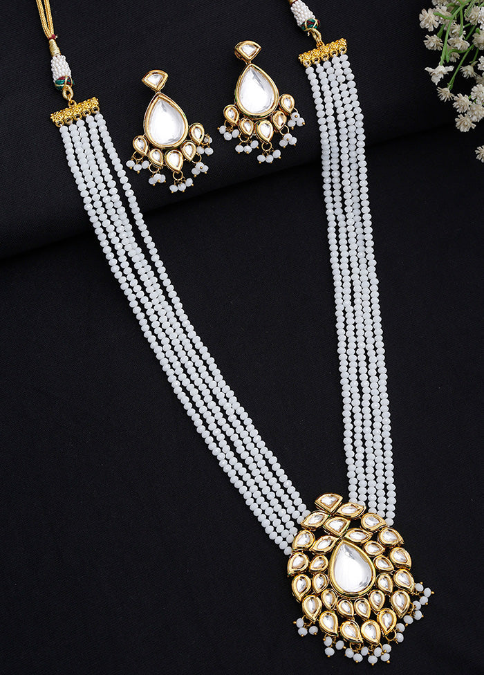 Gold Plated Kundan Jewellery Set With White Beads