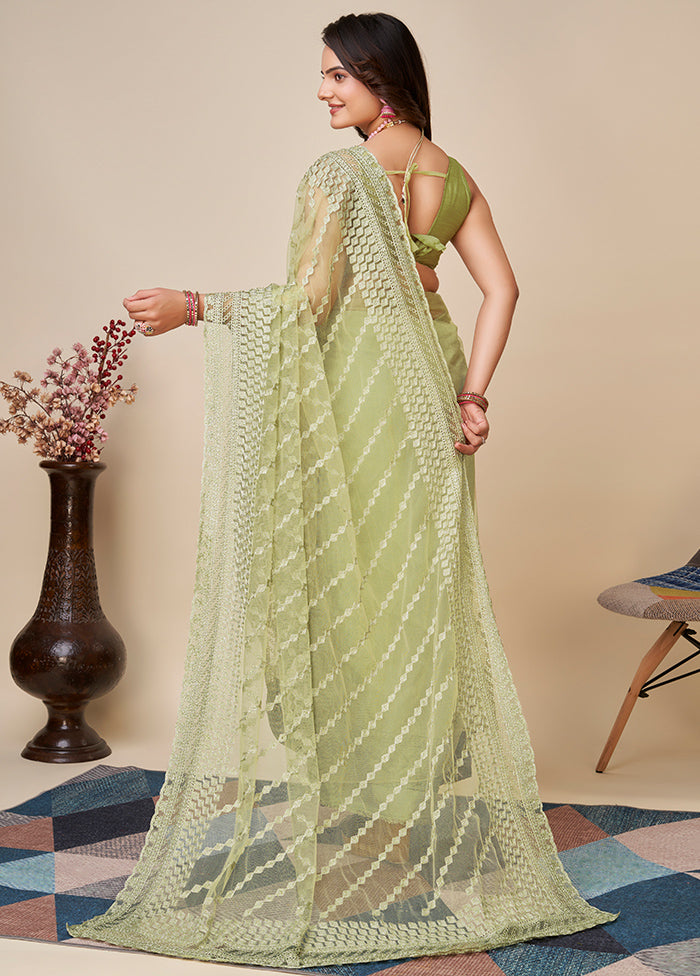 Pista Green Net Saree With Blouse Piece