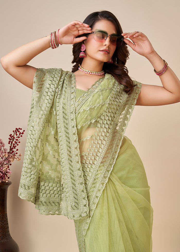 Pista Green Net Saree With Blouse Piece