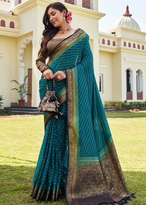 Teal Blue Georgette Saree With Blouse Piece