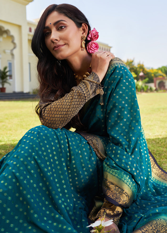 Teal Blue Georgette Saree With Blouse Piece