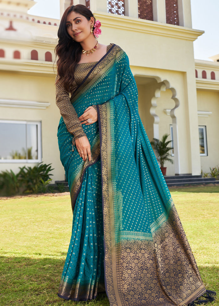 Teal Blue Georgette Saree With Blouse Piece