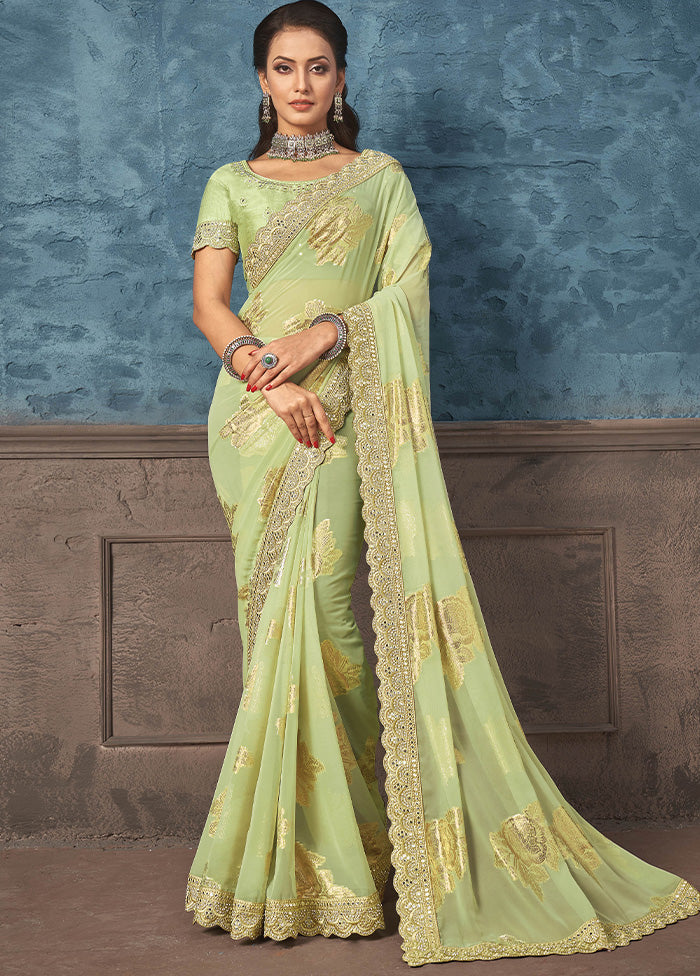 Pista Green Georgette Saree With Blouse Piece