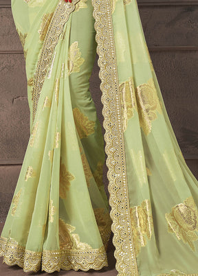 Pista Green Georgette Saree With Blouse Piece