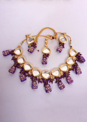 Kundan Studded Purple Jewellery Set With Mangtika