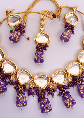 Kundan Studded Purple Jewellery Set With Mangtika