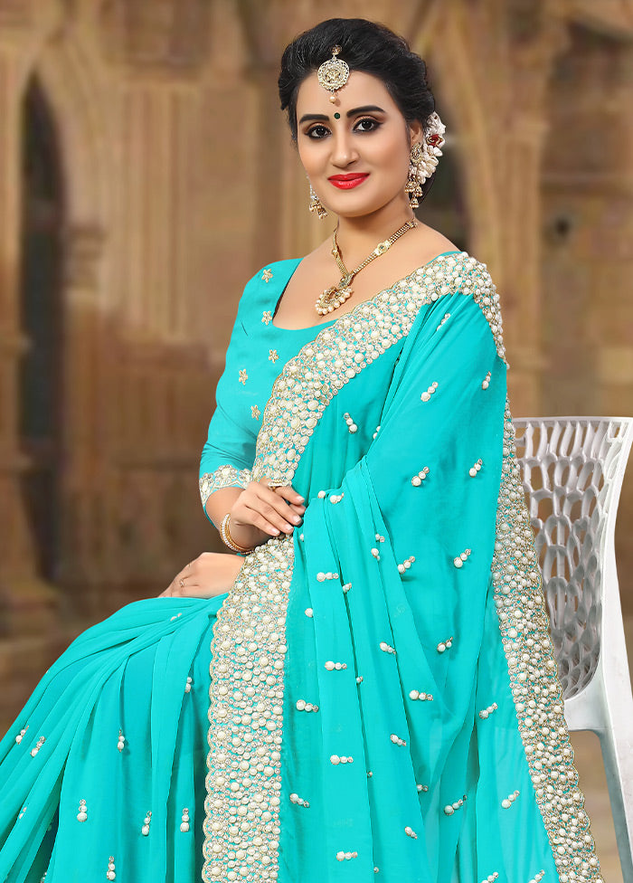 Turquoise Blue Georgette Saree With Blouse Piece