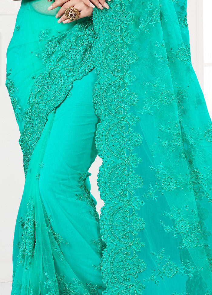 Sea Green Organza Saree With Blouse Piece