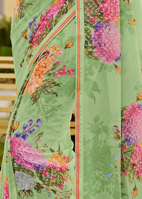 Pista Green Georgette Saree With Blouse Piece