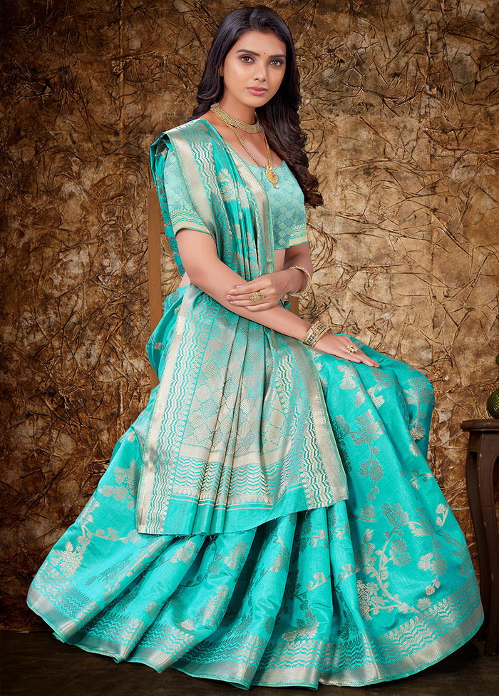 Turquoise Woven Silk Saree With Blouse