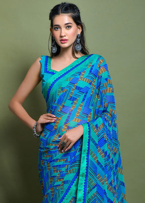 Turquoise Chiffon Silk Saree With Blouse Piece