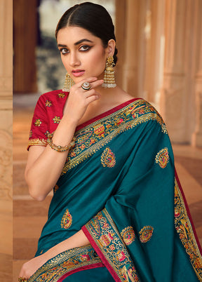 Teal Blue Zari Woven Spun Silk Saree With Blouse Piece