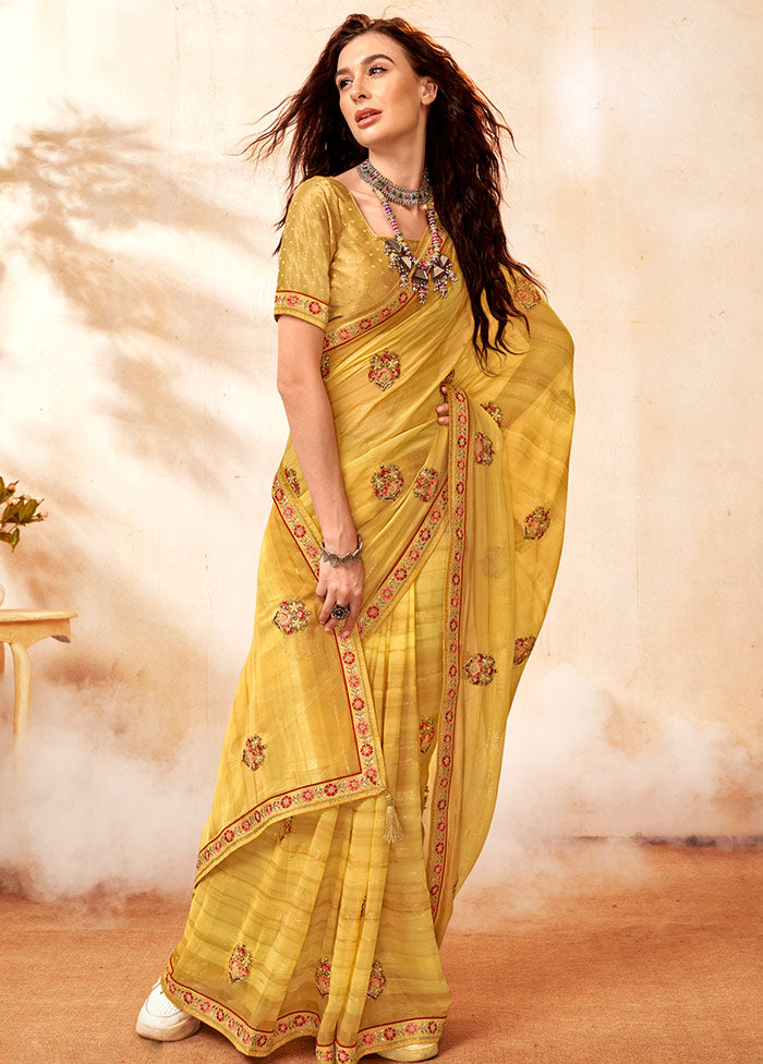 Yellow Georgette Embroidered Saree With Blouse Piece