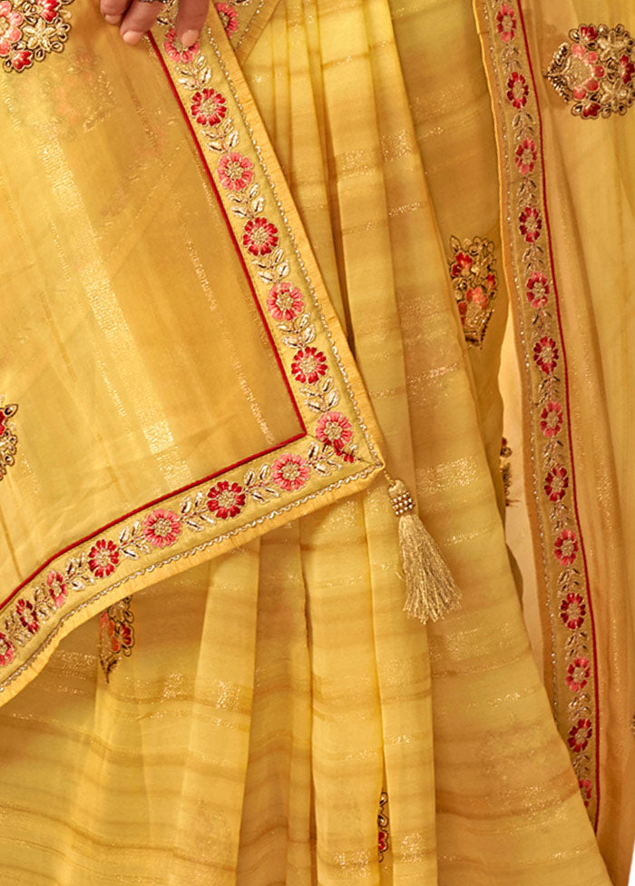 Yellow Georgette Embroidered Saree With Blouse Piece